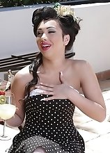 Holly takes off her sexy polka dot dress to expose her thick strong juicy dick underneath