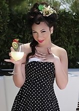 Holly takes off her sexy polka dot dress to expose her thick strong juicy dick underneath